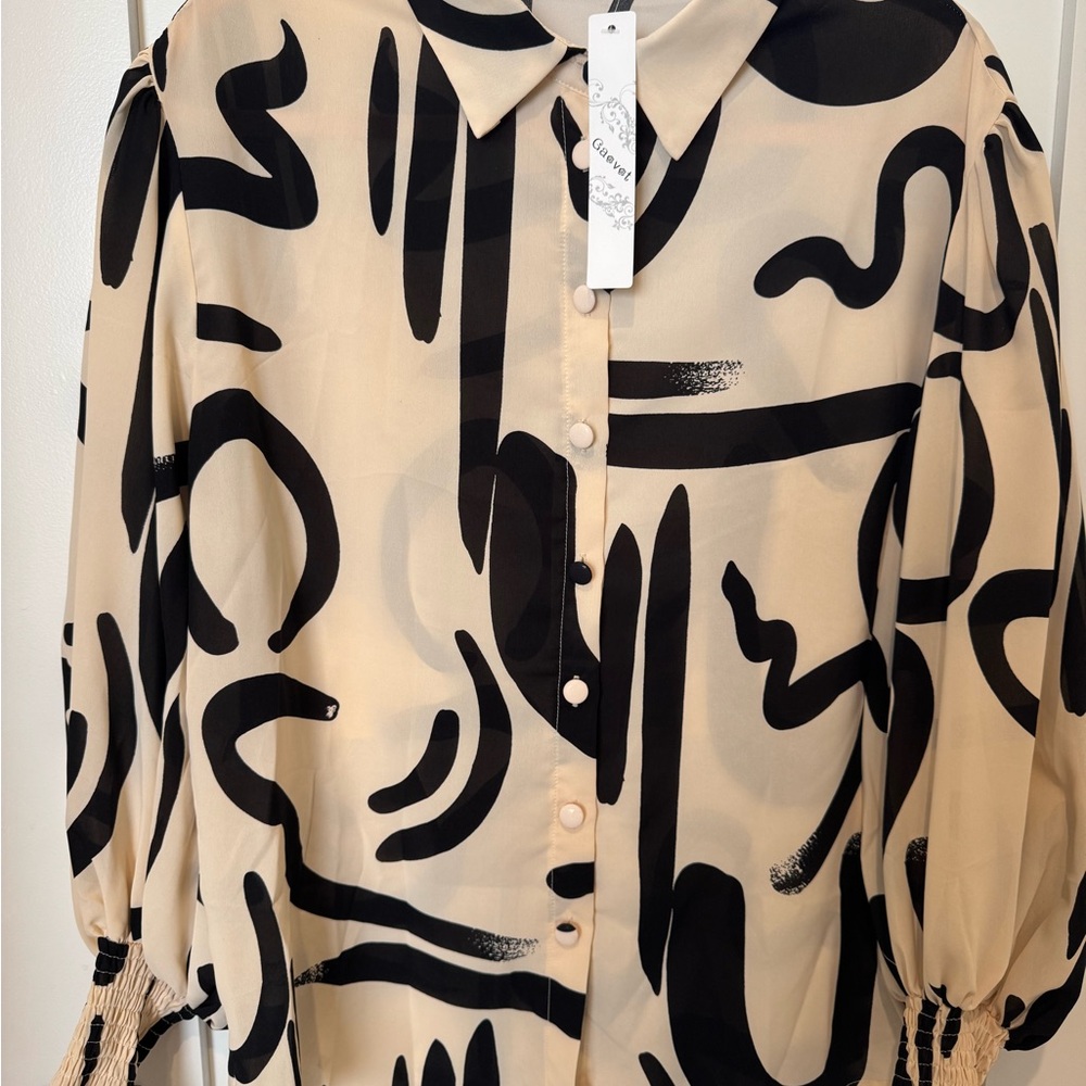 Chic Black and Cream Abstract Blouse